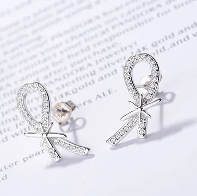 Modern Diamond Ring-1 Pair Simple Style Classic Style Bow Knot Inlay Copper Rhinestones Ear Studs